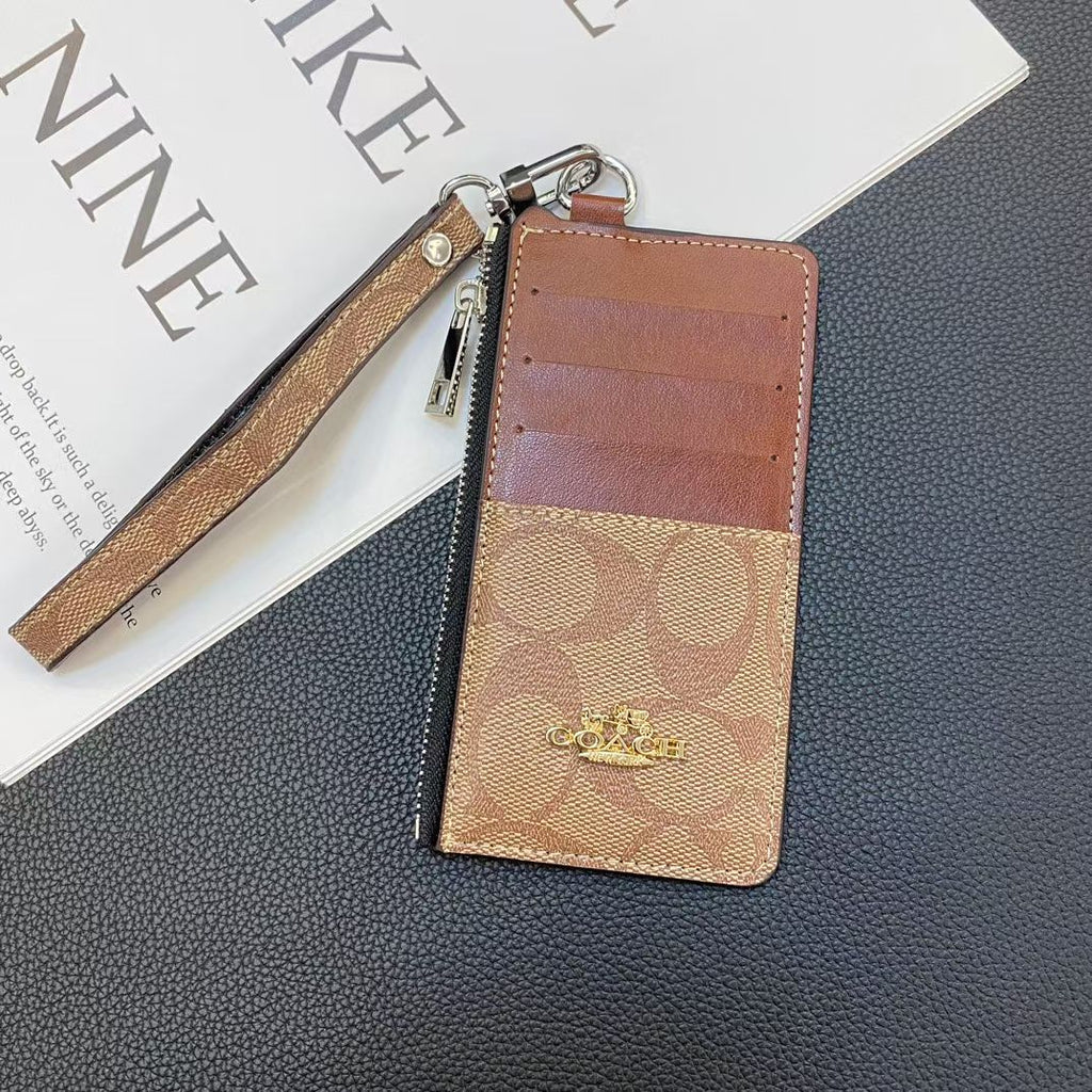 Coach Signature Zip Card Holder Wallet with Wrist Strap – Compact Luxury Card Case