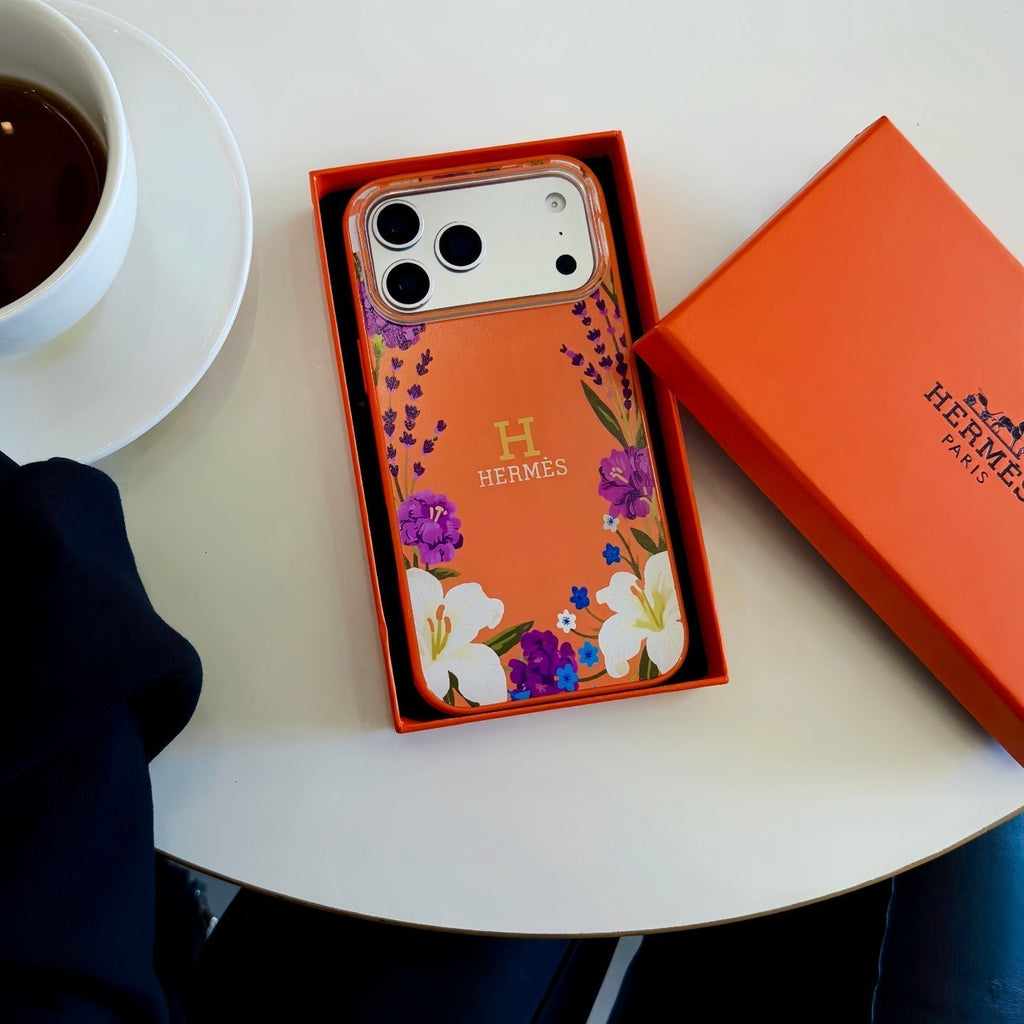 Hermès Floral Signature Case with Wrist Charm for iPhone 13 to 17 Pro Max