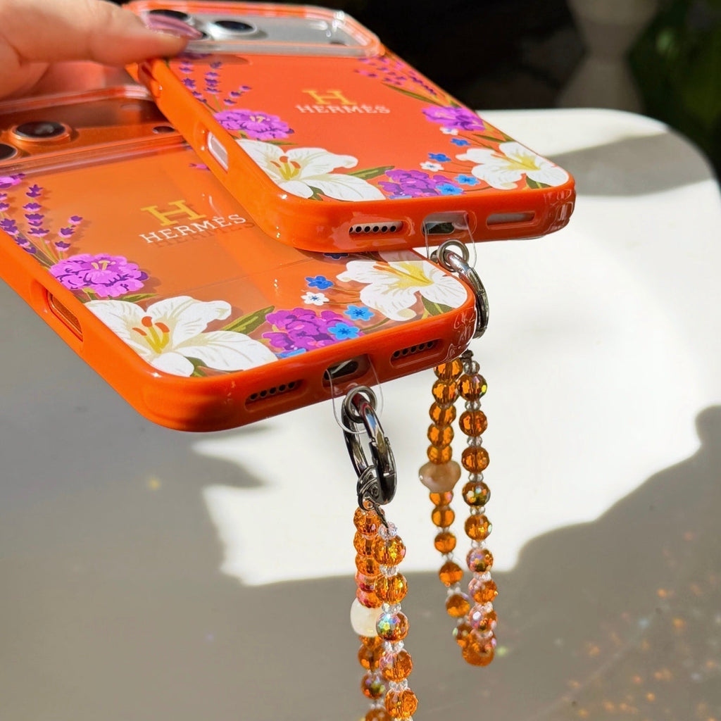 Hermès Floral Signature Case with Wrist Charm for iPhone 13 to 17 Pro Max
